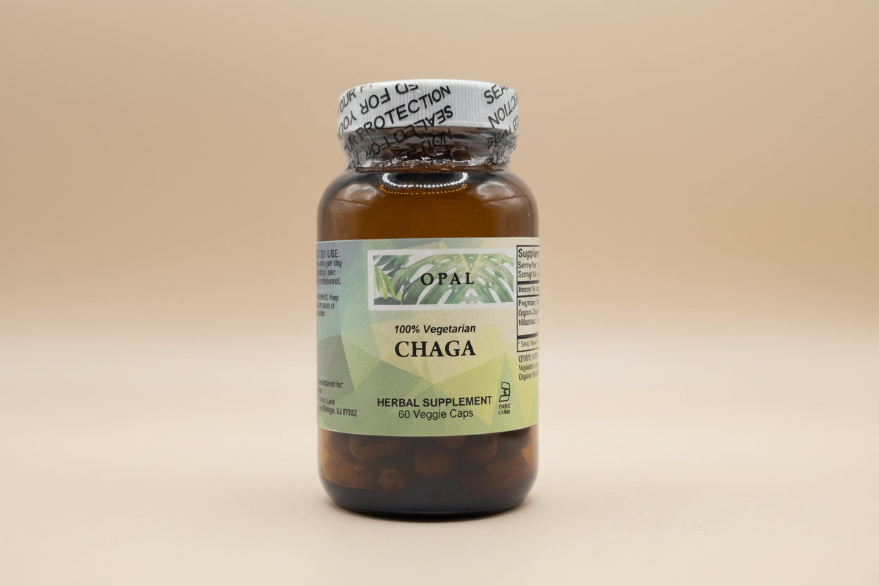 Brown bottle with a green label, "Opal 100% Vegetarian Chaga," on a beige background.